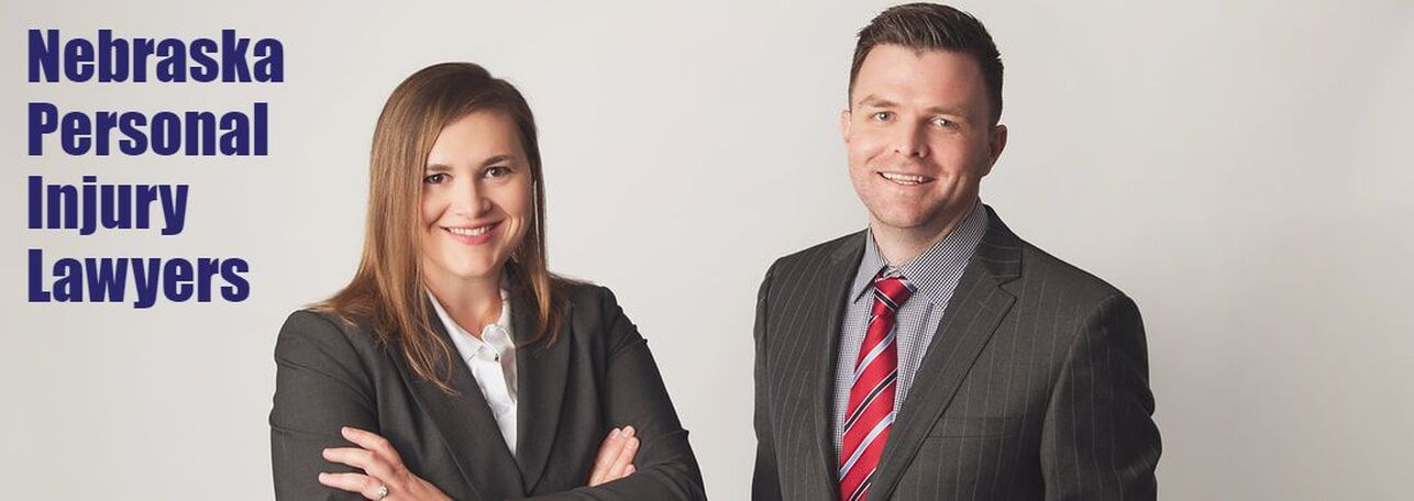 Holly Morris and Brody Ockander photograph with text Nebraska Personal Injury Lawyers